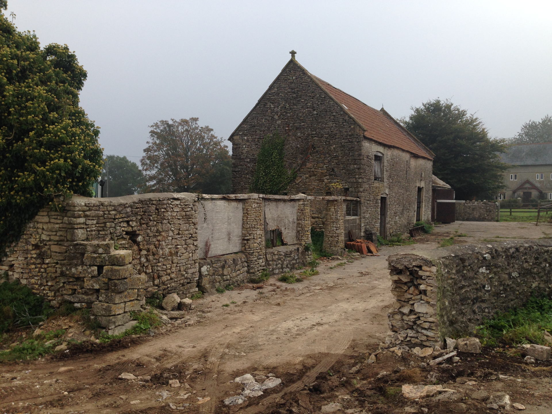 Derelict Mendip stone barn and outbuildings prior to conversion